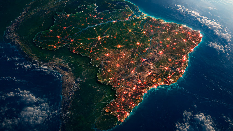 Mapa do Brasil com diversos pontos iluminados e conectados entre si, representando a cobertura da Tracker para rastreamento veicular via rede mesh.